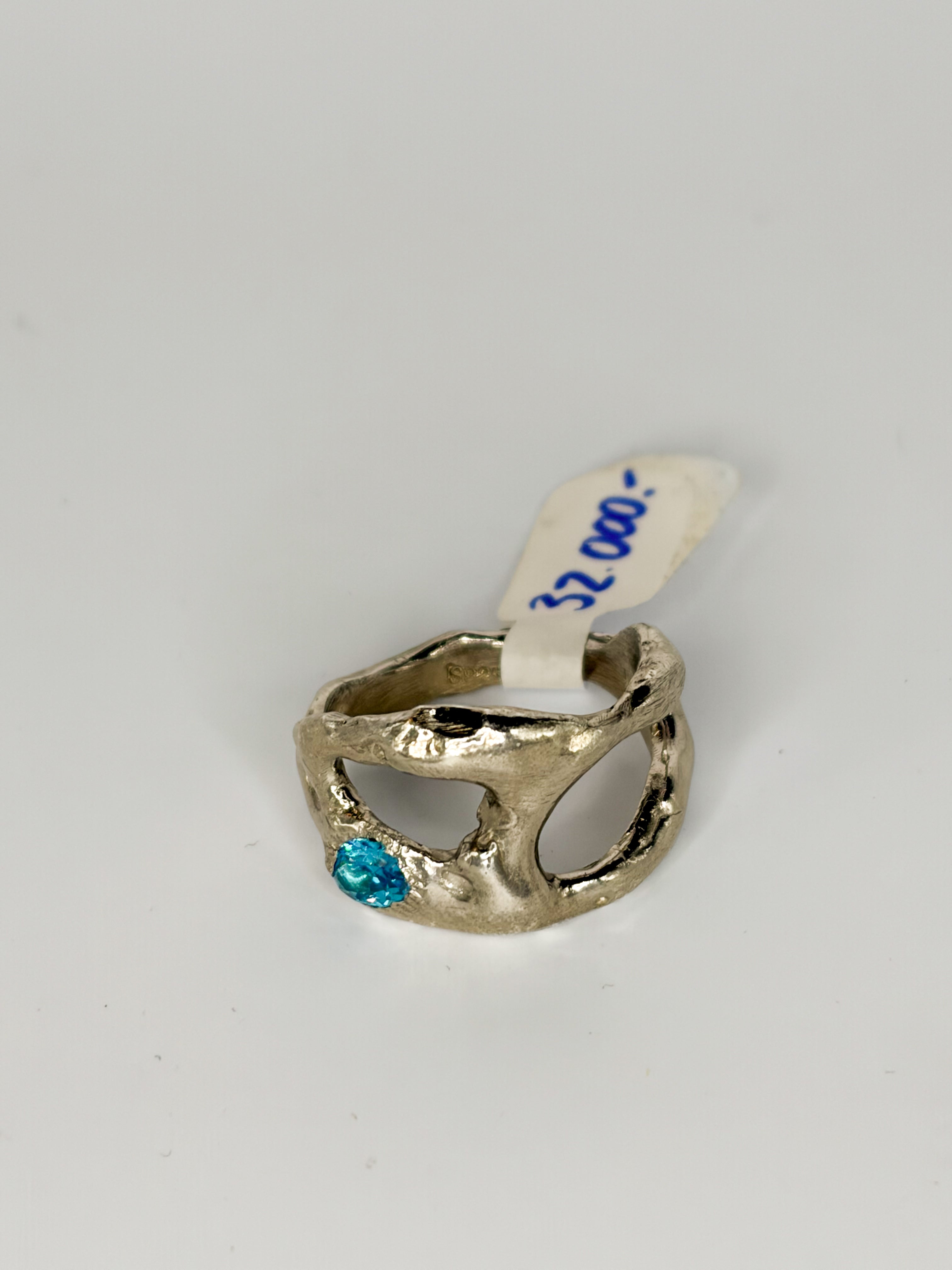 One of a kind ring in recycled 925 silver with rhodium plating and round blue cubic zirconia stone, size 7.5 US / 56mm